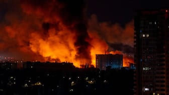 Flames and smoke billow from buildings during mass Russian drones and missile strikes on the Ukraine's capital Kyiv on July 4, 2025, amid the Russian invasion of Ukraine. (Photo: OLEKSII FILIPPOV/AFP)