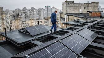 Valerii Pyndyk, head of a housing association board, appears on the roof of an apartment building, where solar panels were installed, in Kyiv, Ukraine, Nov. 14, 2024. (Representative Photo, Credit: Reuters)