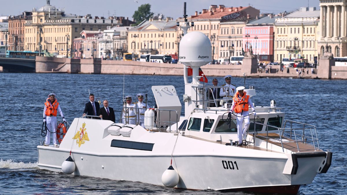 Russian President Vladimir Putin, third from left, stands aboard the Raptor boat during his visit to St. Petersburg on Navy Day, Russia, on Sunday, July 27, 2025. (Alexei Danichev, Sputnik, Kremlin Pool Photo via AP) Russian President Vladimir Putin, third from left, stands aboard the Raptor boat during his visit to St. Petersburg on Navy Day, Russia, on Sunday, July 27, 2025. (Alexei Danichev, Sputnik, Kremlin Pool Photo via AP)