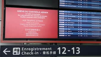 A departures information board is seen at Roissy Charles-de-Gaulle airport, outside Paris, on July 3, 2025, as French air traffic controllers launched a two-day strike to demand better working conditions, disrupting travel for tens of thousands of people at the start of a summer holiday season. AFP
