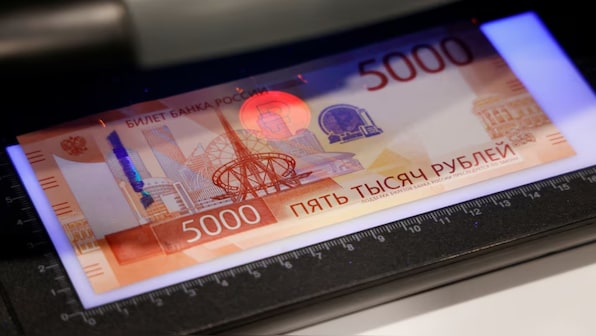 In Putin vs Trump tiff, rouble trouncing dollar with 45% rise against US currency this year