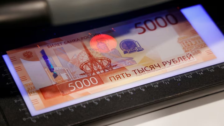 In Putin vs Trump tiff, rouble trouncing dollar with 45% rise against US currency this year