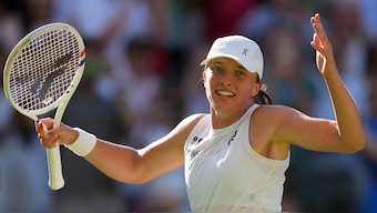 Five-time Grand Slam champion Iga Swiatek celebrates after defeating Belinda Bencic to reach her maiden Wimbledon final at the Centre Court on Thursday, 10 July. AP