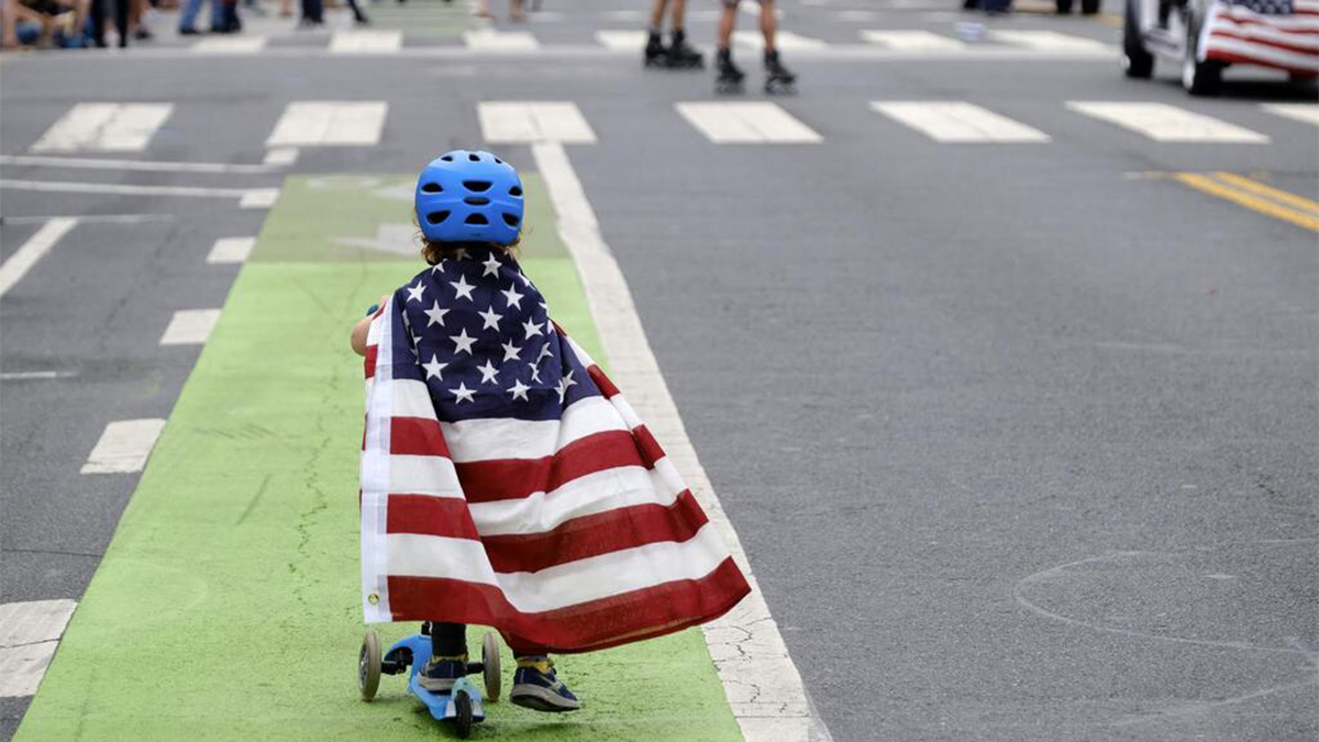 (File) Two-and-a-half-year-old Zacky Kaplan rides his scooter while draped in the American flag as he makes his way along the parade route during the Santa Monica Fourth of July Parade on July 4, 2019 in Santa Monica, California. AP (File) Two-and-a-half-year-old Zacky Kaplan rides his scooter while draped in the American flag as he makes his way along the parade route during the Santa Monica Fourth of July Parade on July 4, 2019 in Santa Monica, California. AP