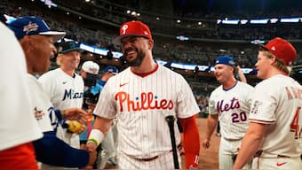 Philadelphia Phillies Kyle Schwarber celebrates after winning the tiebreaker at the MLB baseball All-Star game between the American League and National League. Image: AP 
