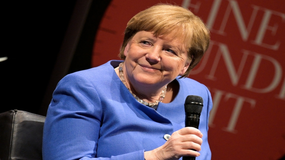 I made the mistake of saying, Donald, let's shake hands, and he didn't: Merkel on 'attention-seeker' Trump