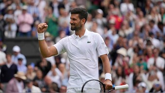 Novak Djokovic celebrates after defeating Alex de Minaur to advance to the Wimbledon quarter-finals on Monday, 7 July. AP