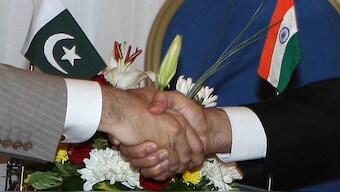 Pakistan's Prime Minister Yousaf Raza Gilani (L) shakes hands with India's Prime Minister Manmohan Singh during the 15th Non-Aligned Movement (NAM) summit in the Egyptian Red Sea tourist resort of Sharm el-Sheikh, July 16, 2009. File Image/Reuters