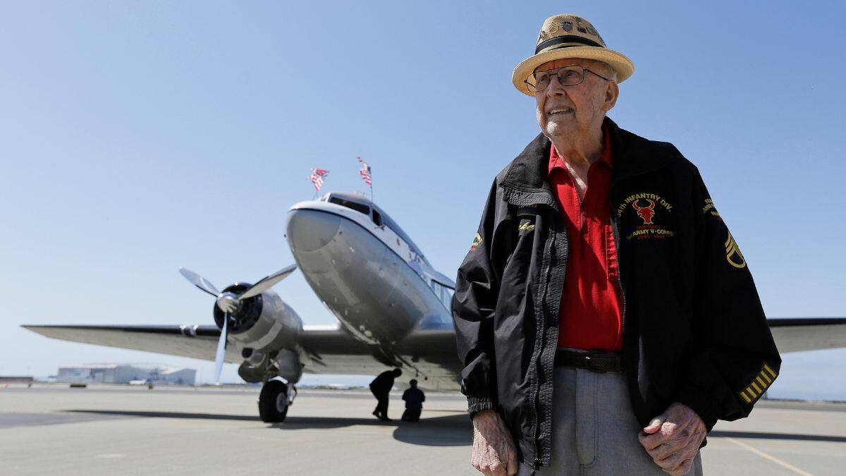 In this photo taken April 29, 2019, D-Day veteran Jake Larson poses before going for a ride in the "The Spirit of Benovia" World War II-era aircraft in Oakland, California, US. File Image/AP