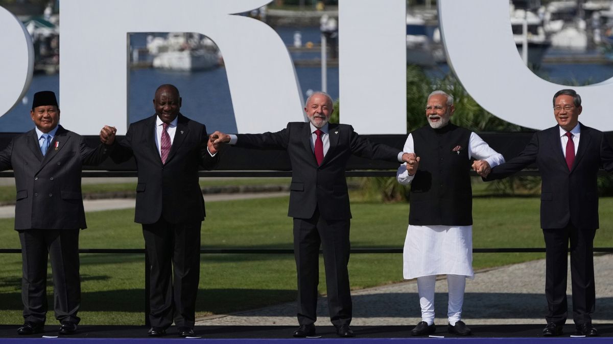 From left, Indonesia's President Prabowo Subianto, South Africa's President Cyril Ramaphosa, Brazilian President Luiz Inacio Lula da Silva, India's Prime Minister Narendra Modi and China's Premier Li Qiang pose for a group photo at the 17th annual BRICS summit in Rio de Janeiro, Sunday, July 6, 2025. (AP Photo) From left, Indonesia's President Prabowo Subianto, South Africa's President Cyril Ramaphosa, Brazilian President Luiz Inacio Lula da Silva, India's Prime Minister Narendra Modi and China's Premier Li Qiang pose for a group photo at the 17th annual BRICS summit in Rio de Janeiro, Sunday, July 6, 2025. (AP Photo)