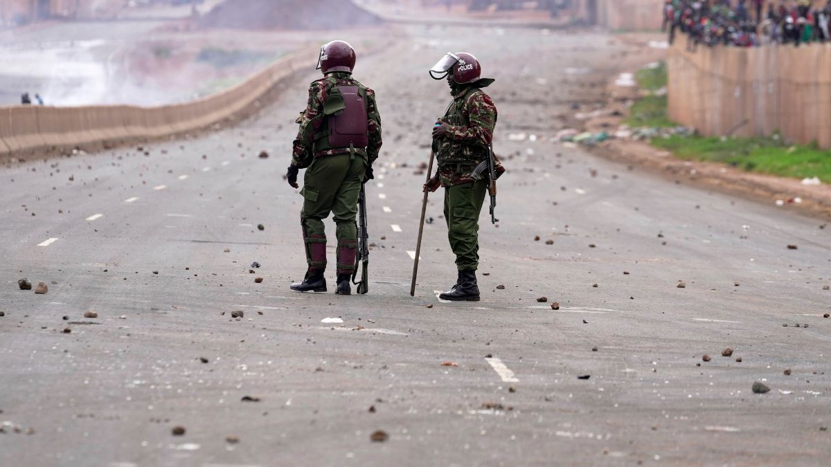 (File) Riot police patrol on a road covered with rocks, during demonstrations to mark the historic 1990 Saba Saba (a Swahili word that means seven seven) protests for democratic reforms in the Kangemi slum of Nairobi, Kenya, Monday, July 7, 2025. AP (File) Riot police patrol on a road covered with rocks, during demonstrations to mark the historic 1990 Saba Saba (a Swahili word that means seven seven) protests for democratic reforms in the Kangemi slum of Nairobi, Kenya, Monday, July 7, 2025. AP