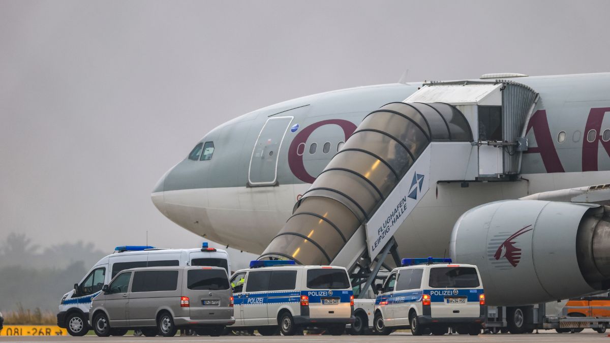 People board a Qatar Airways plane, with federal police vehicles in front of it, on the apron at Leipzig/Halle Airport, Friday, July 18, 2025,- AP People board a Qatar Airways plane, with federal police vehicles in front of it, on the apron at Leipzig/Halle Airport, Friday, July 18, 2025,- AP