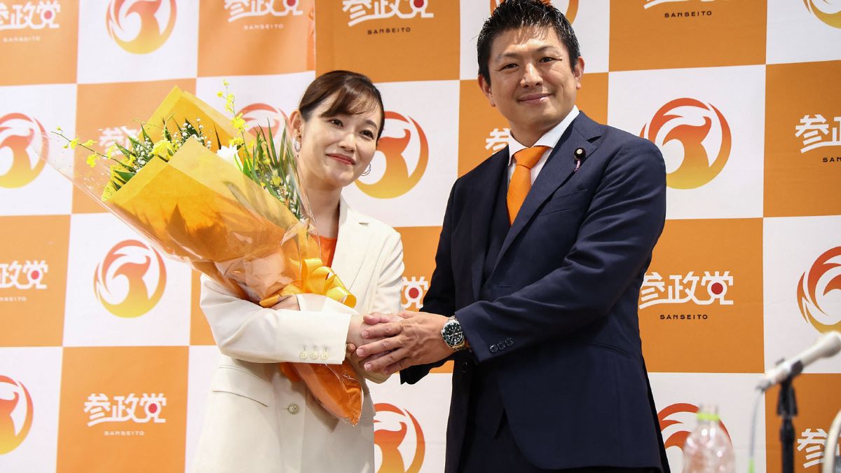Japan's Sanseito party leader Sohei Kamiya (R) shakes hands with candidate Saya (L) at a vote-counting centre in Tokyo on July 20, 2025. Image- AFP Japan's Sanseito party leader Sohei Kamiya (R) shakes hands with candidate Saya (L) at a vote-counting centre in Tokyo on July 20, 2025. Image- AFP