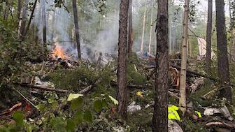 This handout picture released by the Far Eastern Transport Prosecutor's Office on July 24, 2025, shows what it said is the crash site of the Antonov AN-24 passenger plane outside the town of Tynda in Russia's far eastern Amur region. Image- AFP