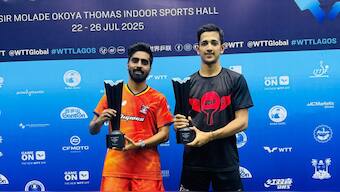 Sathiyan Gnanasekaran and Akash Pal pose with their trophies after being crowned men's doubles champions at the WTT Contender event in Lagos, Nigeria. Image credit: Reliance Foundation