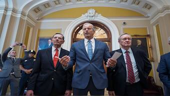 Senate Majority Leader John Thune, R-SD, is flanked by Sen. John Barrasso, R-Wyo., the GOP whip, left, and Finance Committee Chairman Mike Crapo, R-Idaho, speaks to reporters just after passage of the budget reconciliation package of President Donald Trump's signature bill of big tax breaks and spending cuts, at the Capitol in Washington, on Tuesday. AP