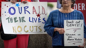 Federal workers and supporters rally outside of the State Department, on June 27, 2025, in Washington. AP File