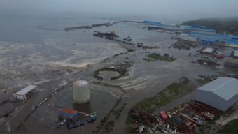 Tsunami waves flood an area after a powerful magnitude 8.8 earthquake struck off Russia's far eastern Kamchatka Peninsula, in Severo-Kurilsk, Sakhalin Region, Russia. Reuters