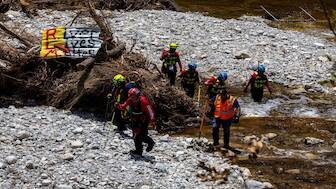 Search and rescue team members look for missing people amid debris in the waters of the Guadalupe River, near Camp Mystic, following deadly flooding, in Hunt, Texas, US, on Thursday. Reuters File