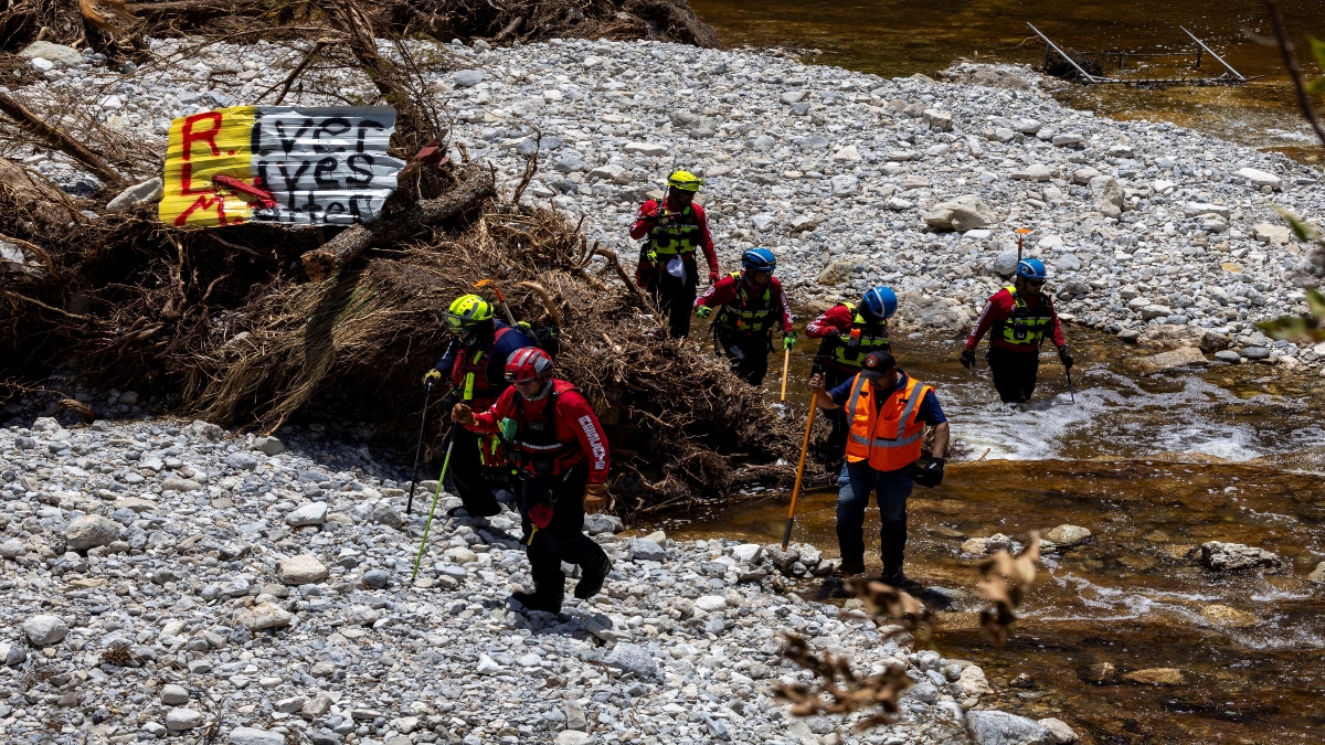 Search and rescue team members look for missing people amid debris in the waters of the Guadalupe River, near Camp Mystic, following deadly flooding, in Hunt, Texas, US, on Thursday. Reuters File Search and rescue team members look for missing people amid debris in the waters of the Guadalupe River, near Camp Mystic, following deadly flooding, in Hunt, Texas, US, on Thursday. Reuters File