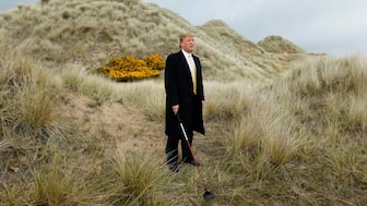 US property mogul Donald Trump leads a media event on the sand dunes of the Menie estate, the site for Trump's proposed golf resort, near Aberdeen, north east Scotland, May 27, 2010. File Image/Reuters