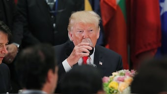 US President Donald Trump sips Diet Coke from his wine glass after a toast, during a luncheon for world leaders at the 73rd session of the United Nations General Assembly in New York, US, September 25, 2018. File Image/Reuters