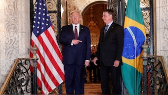 US President Donald Trump hosts a photo-op with Brazilian President Jair Bolsonaro before attending a working dinner at the Mar-a-Lago resort in Palm Beach, Florida, US, March 7, 2020. File Image/Reuters