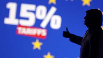 A 3D-printed miniature of US President Donald Trump, EU flag and words "15% tariffs" are seen in this illustration taken July 27, 2025. File Image/Reuters