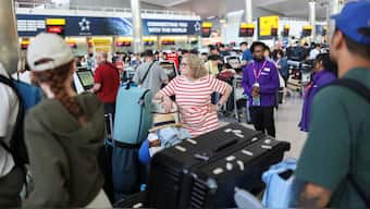 Passengers wait at Heathrow Airport, after radar failure led to the suspension of outbound flights across the UK, in Hounslow, London, Britain, July 30, 2025. File Image/Reuters