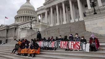 Faith leaders and students stage a sit-in protest to urge the US Senate to pass the Freedom To Vote: John R Lewis Act on the steps of the US Capitol building in Washington, US, January 18, 2022. File Image/Reuters