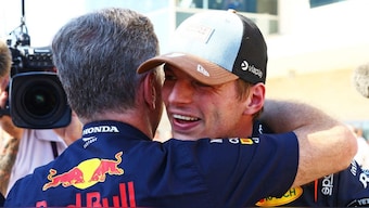 A still of Christian Horner and Max Verstappen embracing each other. AFP