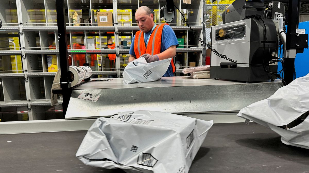 A person works at the Amazon warehouse, busy on Prime Day, in Melville, New York, US. Reuters file A person works at the Amazon warehouse, busy on Prime Day, in Melville, New York, US. Reuters file