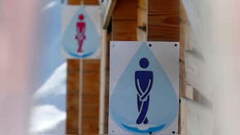 Unique toilet signs are seen near the alpine slopes of Rosa Khutor, near Sochi February 14, 2013. File Photo/Reuters