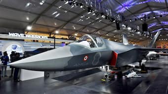 Visitors stand next to a prototype of the Advanced Medium Combat Aircraft (AMCA), India's most advanced stealth fighter jet, at the Aero India 2025 air show at Yelahanka air base in Bengaluru, February 11, 2025. File Photo/Reuters