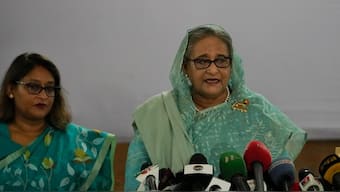 FILE- Bangladesh Prime Minister Sheikh Hasina, centre, is flanked by her daughter Saima Wazed. AP