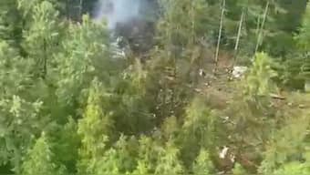 Smoke rises at the crash site of an Angara Airlines An-24 passenger plane near Tynda in the Amur Region, Russia July 24, 2025, in this still image taken from video. Federal Air Transport Agency/Handout via Reuters