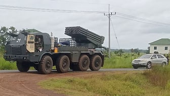A Cambodian BM-21 multiple rocket launcher returns from the Cambodia-Thai border as Cambodian and Thai troops exchanged fire in a new round of clashes in Preah Vihear province on July 24, 2025. AFP