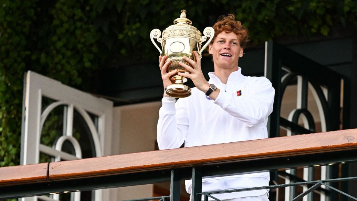 Jannik Sinner brandishes his Wimbledon 2025 title. AP Jannik Sinner brandishes his Wimbledon 2025 title. AP
