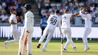England's Brydon Carse, second right, celebrates with teammates after the dismissal of India's captain Shubman Gill. AP
