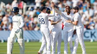 Yashasvi Jaiswal walks back to the dressing room as Jofra Archer celebrates with teammates after dismissing the Indian opener on Day 4 of the third Test at Lord's. Reuters