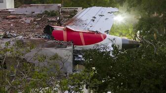 The wreckage of the Air India plane that crashed moments after taking off from the Ahmedabad airport, lies on a building, in Ahmedabad. Both switches feeding fuel to the two engines of Air India flight 171 were cut off followed before the plane crashed in Ahmedabad, seconds after taking off, the first investigation report into the crash has revealed. PTI