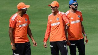 Ashwin and Shubman Gill talking during a practice session. Image: Reuters