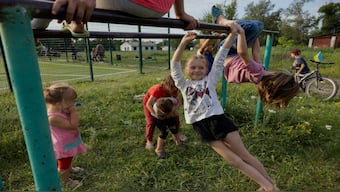 Children play near a public football field in the village in the Dnipropetrovsk region, amid the Russian invasion of Ukraine. Now, Vladimir Putin is offering financial incentives to Russian women to have more children. Representational image/AFP