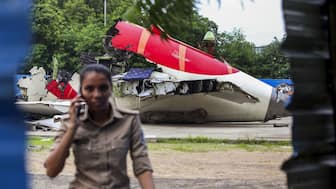Wreckage of Air India's Boeing 787-8 aircraft, which was operating flight AI 171 from Ahmedabad to London, placed under tight security, seen a month after the tragedy, in Ahmedabad. The Aircraft Accident Investigation Bureau (AAIB) published its preliminary report on the crash on Saturday. PTI
