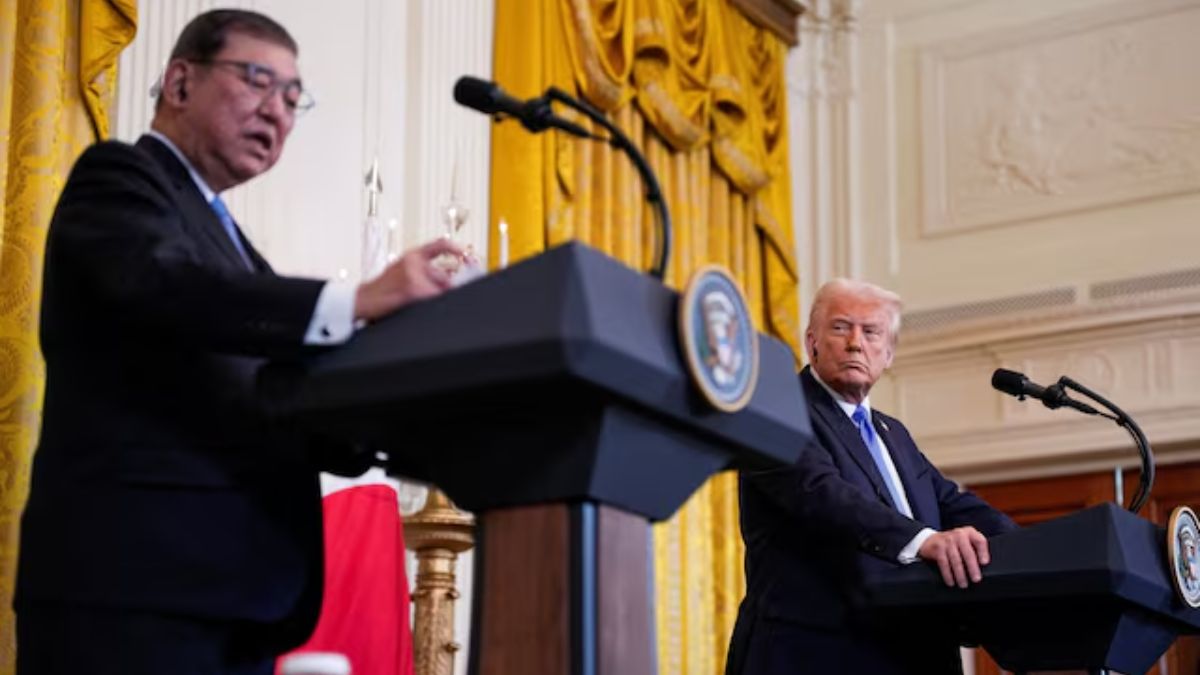 Trump signs executive order to lower US tariffs on Japanese autos to 15%