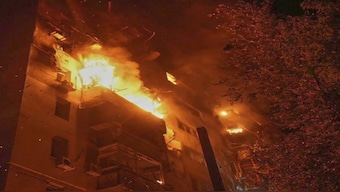In this photo provided by the Ukrainian Emergency Service, a residential building burns following a Russian air attack in Odesa, Ukraine, Saturday, July 19, 2025. AP