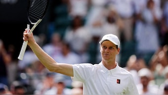 Jannik Sinner celebrates winning his first round match. Image: Reuters