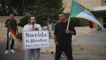 Members of the Druze minority and their supporters protest outside the US Embassy in Jerusalem, amid the clashes between Syrian government forces and Druze armed groups in the southern Syrian city of Sweida. AP
