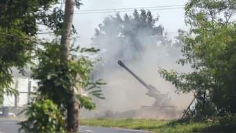 A Thai military mobile unit fires towards Cambodia's side after Thailand and Cambodia exchanged heavy artillery on Friday as their worst fighting in more than a decade stretched for a second day, in Surin, Thailand. Reuters