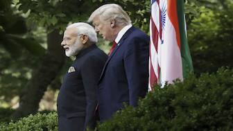 President Donald Trump with Prime Minister Narendra Modi at the White House. The 25 per cent tariff and Russian penalty on India comes even as officials continue to hammer out a trade deal, which has been ongoing since February. File image/AP
